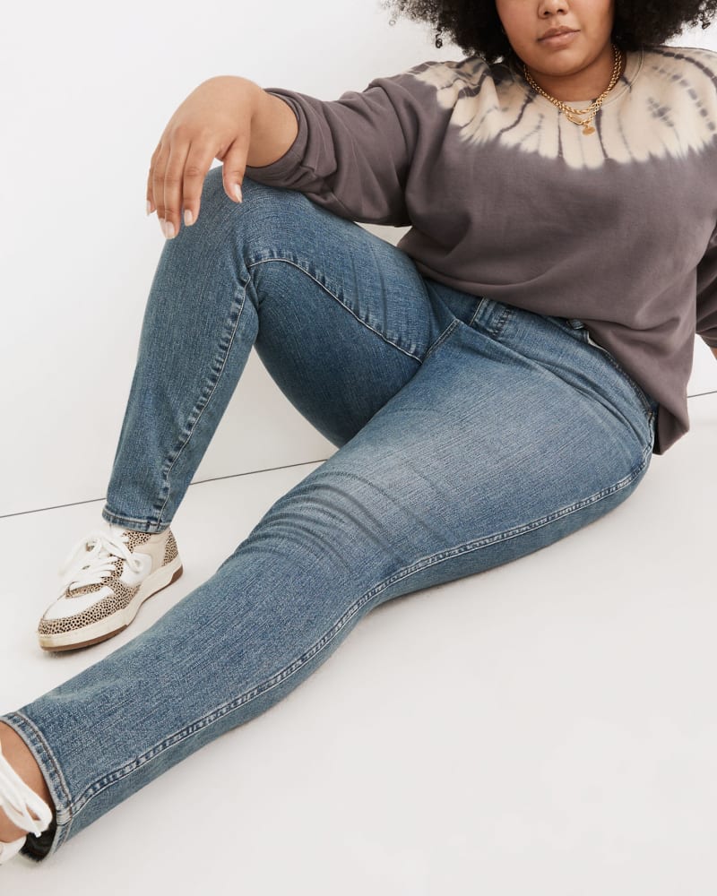 Plus size model wearing High-Rise Skinny Jeans in Woodridge Wash by Madewell | Dia&Co | dia_product_style_image_id:168070